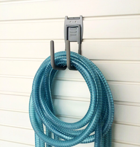 Big J hook mounted on MR SLAT slatwall holding large tools in garage